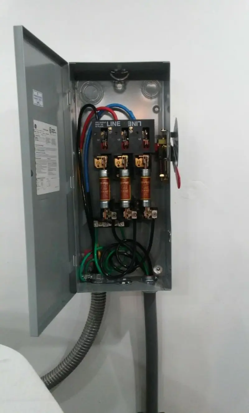 Three-phase disconnect switch installed for Smoke Detector Installation in Leeds