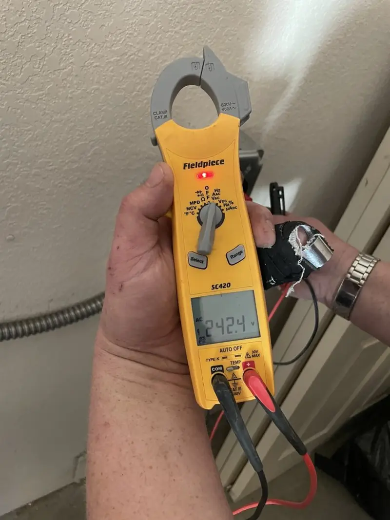 Voltage testing with clamp meter during Circuit Breaker Repair in Leeds